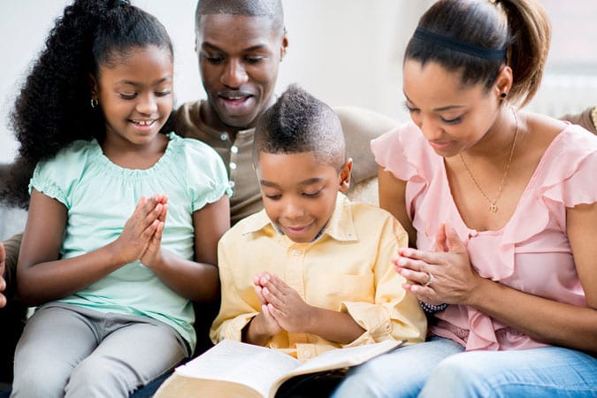 A family praying